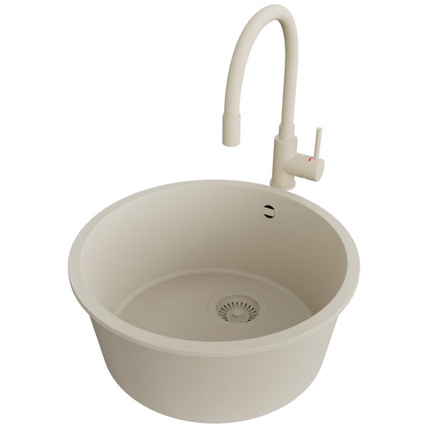 Rundes Spülbecken aus Stein mit Wasserhahn