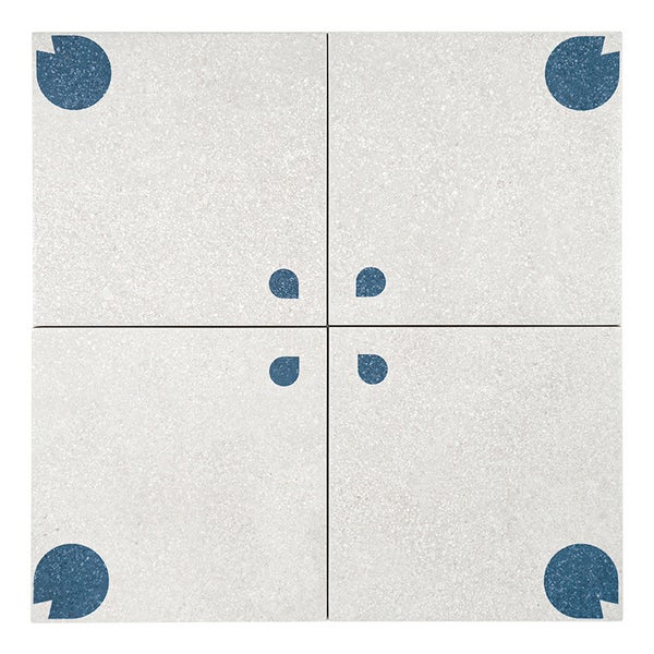 Vier quadratische Fliesen mit Terrazzo Optik und einem geometrischen Muster aus Kreis Segmenten in einer Anordnung