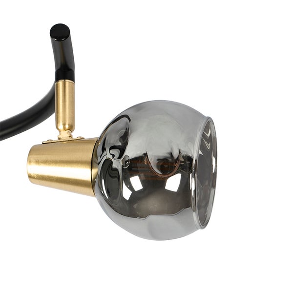 Detailansicht einer Deckenleuchte mit einem Leuchtenschirm aus Glas