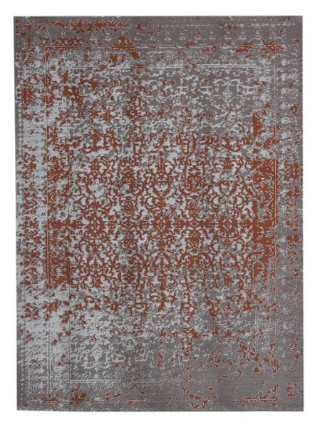 Rechteckiger Teppich mit ornamentalem Vintage-Muster in Grau und Rostbraun.