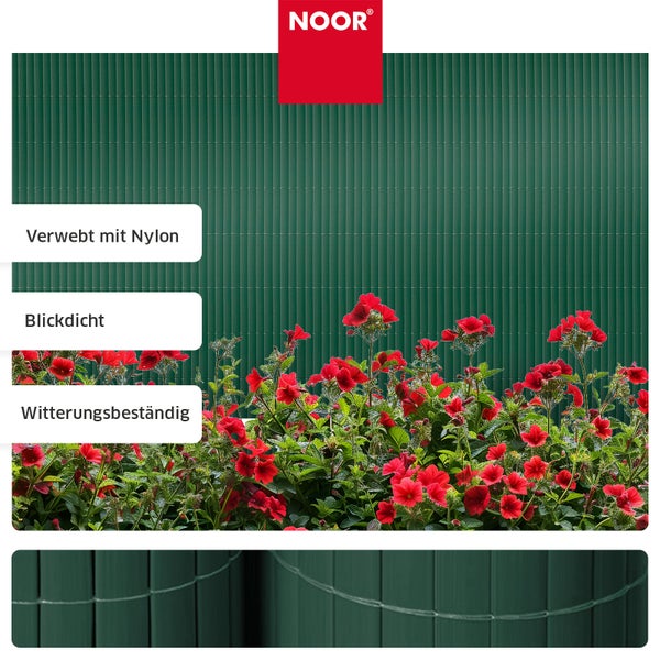 Noor Sichtschutzmatte aus Kunststoff mit Nylongarn verwoben vor einem Beet mit roten Blumen.