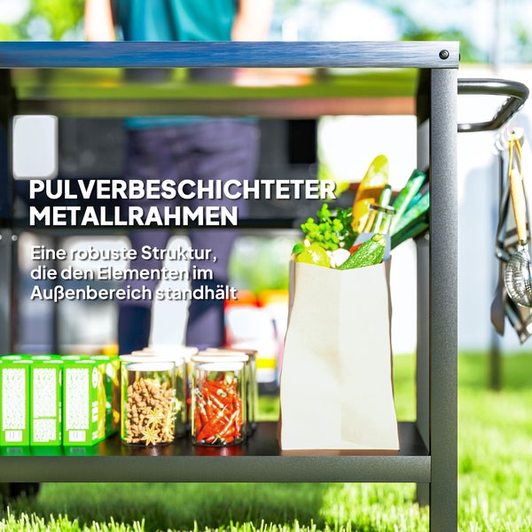 Rollbarer schwarzer Küchenwagen aus Metall mit zwei Ablagen, nutzbar als Barwagen oder Pizza-Ofen-Ständer in einer modernen Küche.