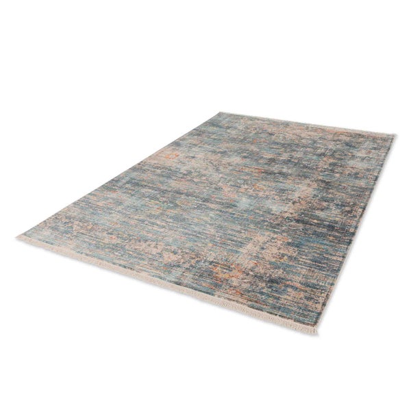 Rechteckiger Teppich im Vintage Look mit kurzen Fransen an den Enden.