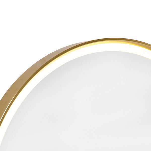 Detailansicht einer runden Deckenleuchte mit goldenem Rahmen und weißem Diffusor