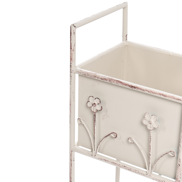 Weiße Metalldekobox mit Blumenmotiv im Shabby-Chic-Stil, rechteckiger Pflanzkasten mit dekorativen Verzierungen und Rahmen.