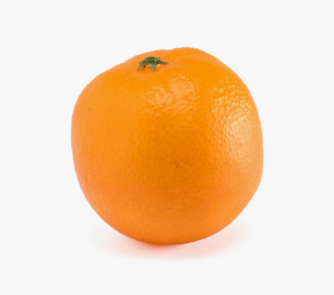 Nahaufnahme der strukturierten Schale einer Orange.