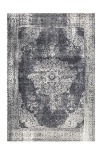 Rechteckiger Teppich im Vintage-Orient-Design mit zentralem Medaillon und ornamentaler floraler Bordüre im Used-Look.