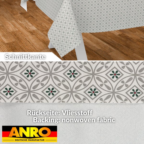 Tischdecke mit geometrischem Muster und Blumenmotiven, Schnittkante, Rückseite aus Vliesstoff, ANRO Logo.