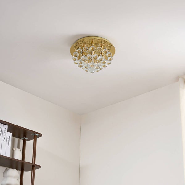 Goldfarbene Deckenleuchte mit Kristallverzierungen für den Innenbereich