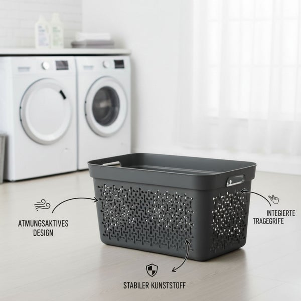 Wäschekorb aus Kunststoff mit Tragegriffen im Badezimmer