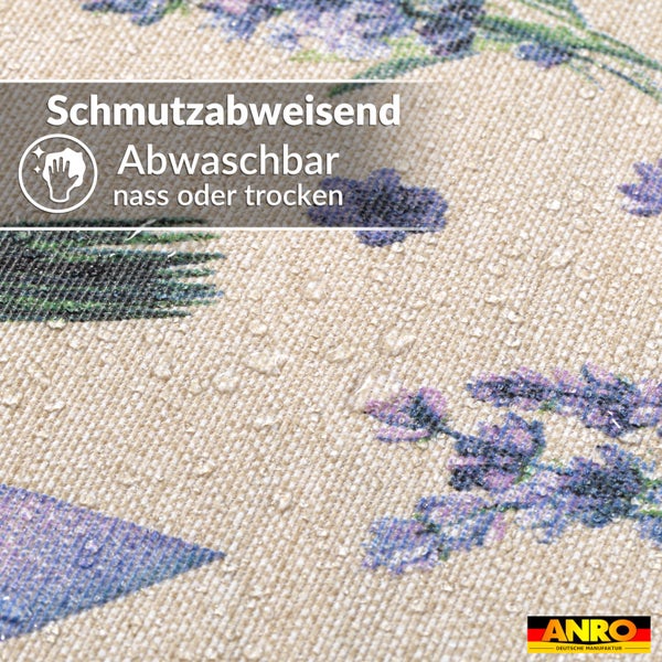 Schmutzabweisender und abwaschbarer Stoff mit Lavendelmuster, Wassertropfen auf der Oberfläche. ANRO Logo.