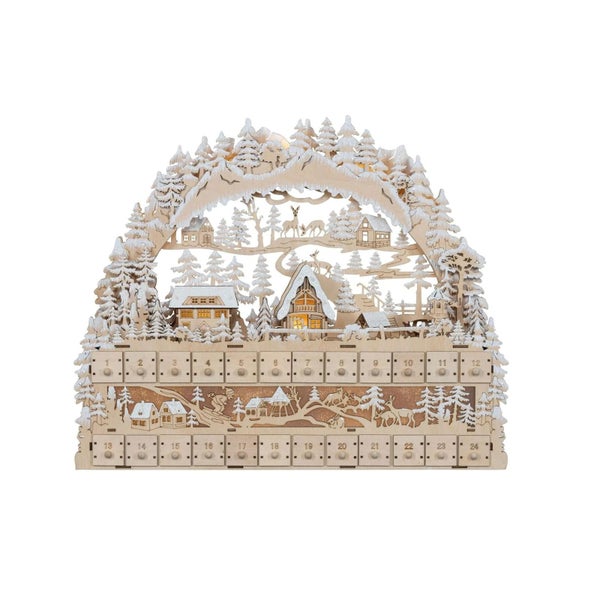 Beleuchteter hölzerner Adventskalender mit 24 Schubladen und winterlicher Waldmotiv Szenerie.