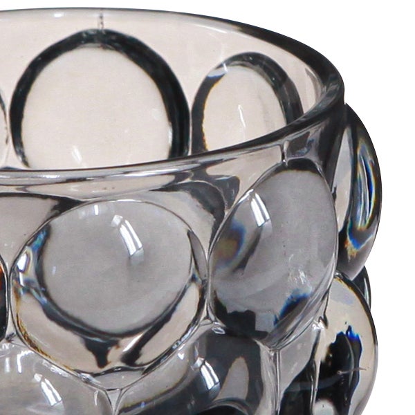 Set aus 6 Teelichthaltern aus grauem Glas mit dekorativer Noppenstruktur.