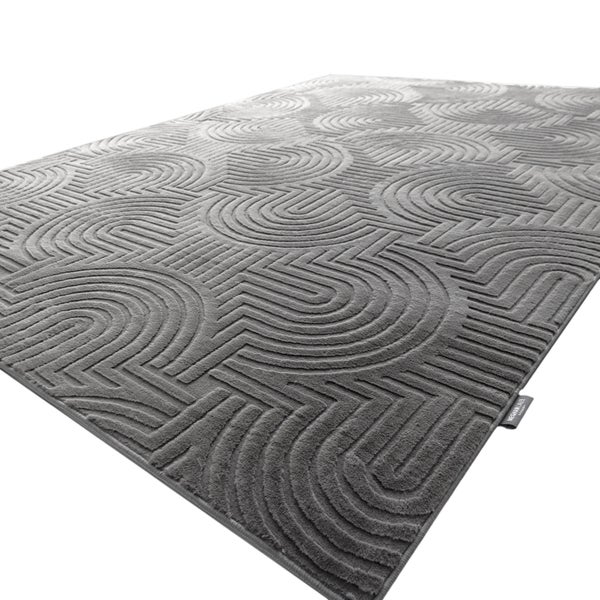 Moderner Teppich mit geometrischem Bogenmuster und eingearbeiteter Struktur auf der Oberfläche