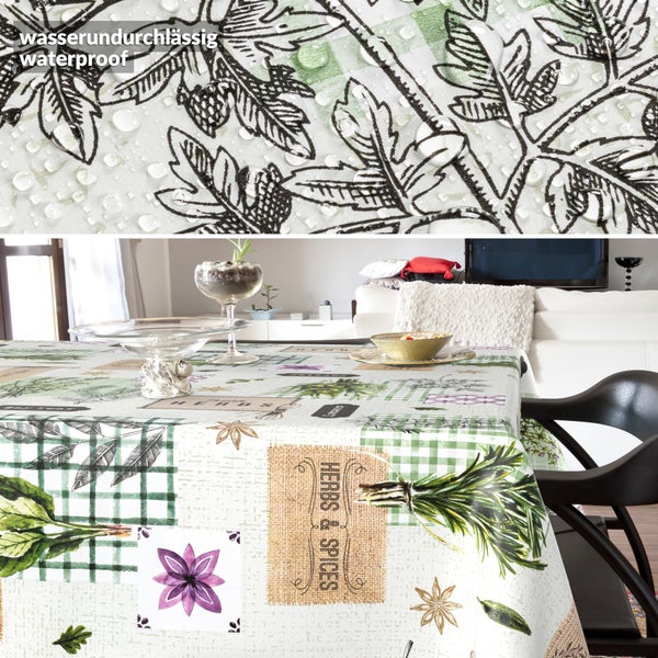 Wasserabweisende Tischdecke mit Kräuter- und Gewürzmuster, Karomuster und floralen Details in einer Wohnzimmerumgebung.