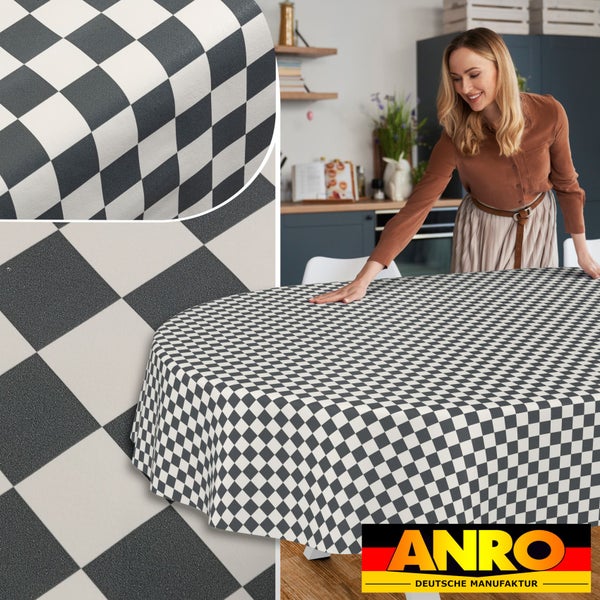 Ovale Tischdecke mit schwarz-weißem Karomuster in einer Küche, inklusive Detailansicht und ANRO Deutsche Manufaktur Logo.