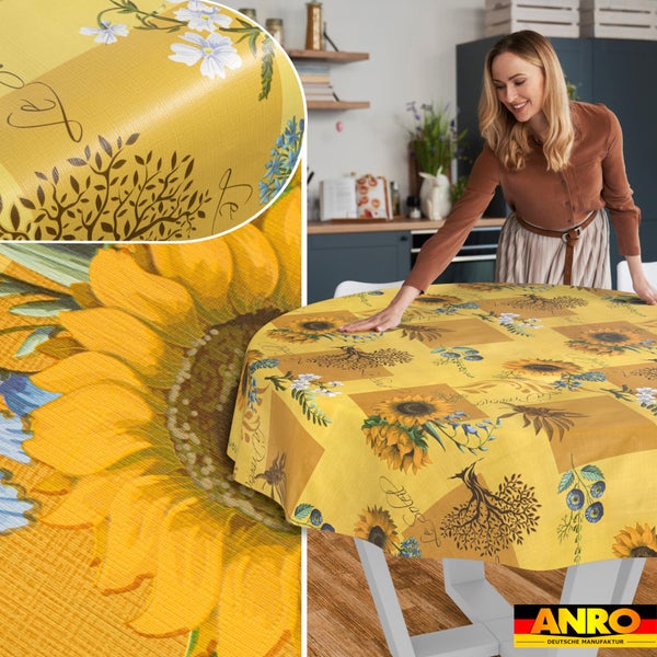 Runde Tischdecke mit Sonnenblumen-Motiv auf einem Tisch in einer hellen Küche, Detailansicht der Struktur und ANRO Deutsche Manufaktur Logo.