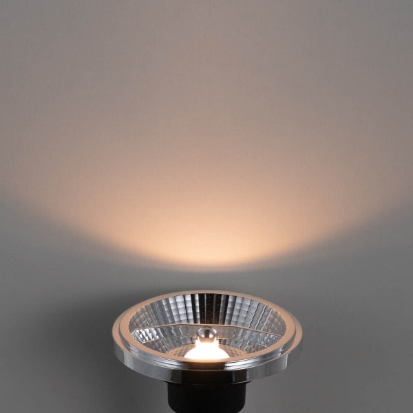 LED-Reflektorlampe mit facettiertem Reflektor und warmweißem Lichtstrahl nach oben.