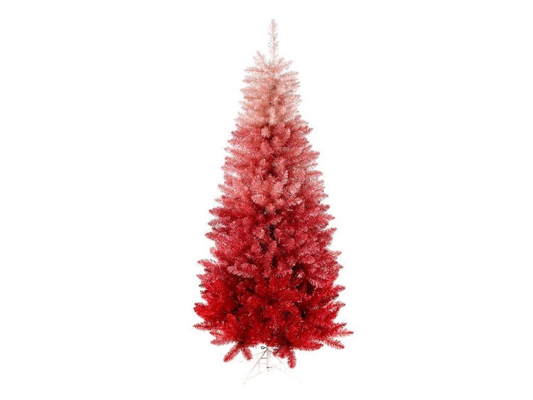 Künstlicher Weihnachtsbaum mit Farbverlauf von dunkel nach hell auf einem Ständer.