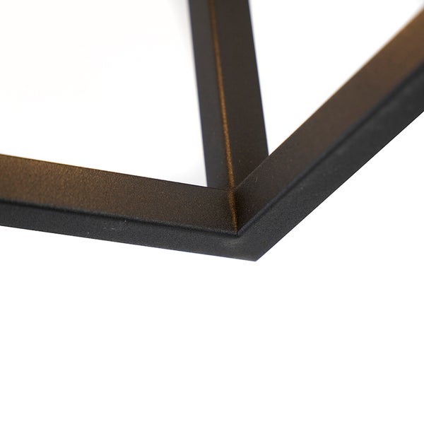 Detailaufnahme einer schwarzen, würfelförmigen Metallleuchte