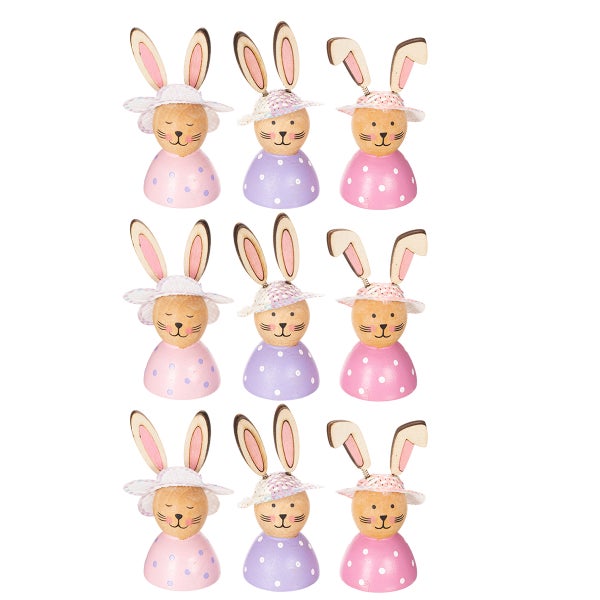 Neun Osterhasenfiguren aus Holz mit Hüten