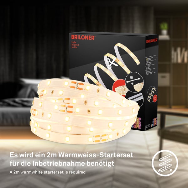 Briloner LED-Streifen warmweiß 2 Meter mit Briloner Logo, Kabelschalter und kürzbarem Band in einem Schlafzimmer.