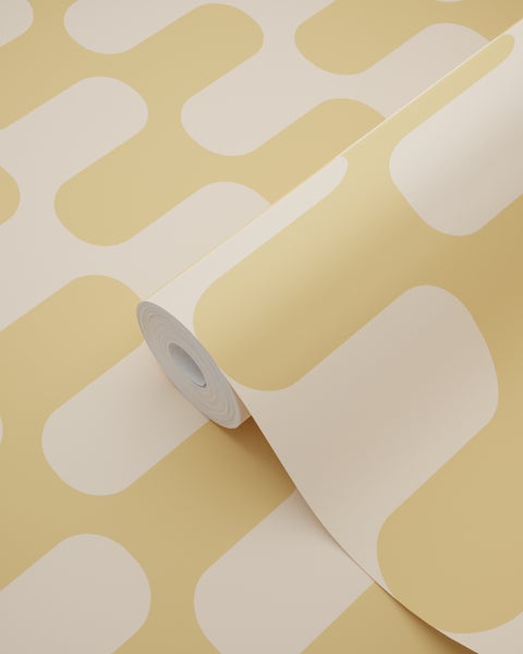 Vliestapete mit großem geometrischem Retromuster in Gelb und Beige.