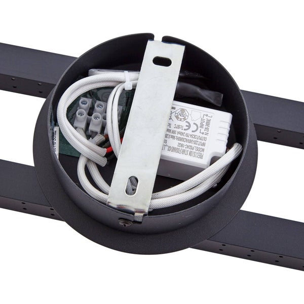 Innenansicht eines schwarzen runden Lampenbaldachins mit Montagebügel aus Metall, weißem LED-Treiber, Verkabelung und Lüsterklemme.