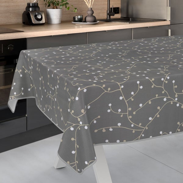 Graue Tischdecke mit floralem Muster auf Küchentisch