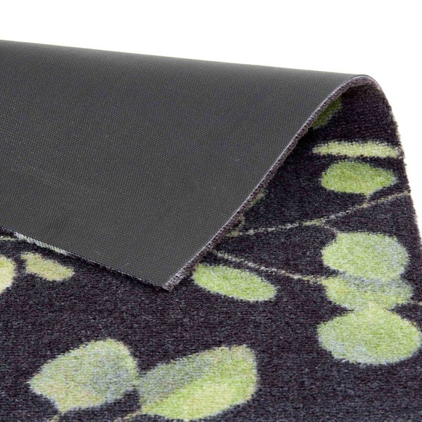 Detailansicht einer Fußmatte mit Pflanzenmuster und rutschfester Rückseite