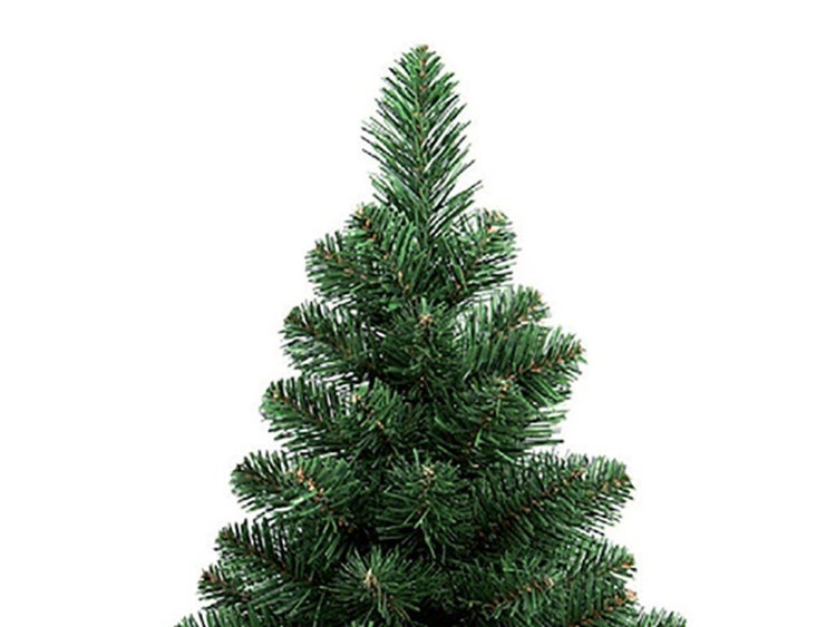 Die Spitze eines künstlichen Weihnachtsbaums mit detaillierten Nadeln.