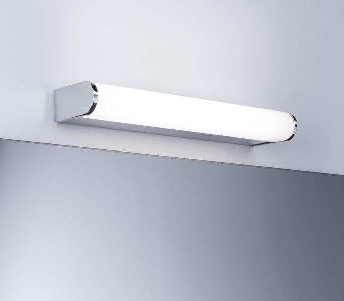 LED-Badspiegelleuchte mit zylindrischem weißem Diffusor und verchromter Halterung.