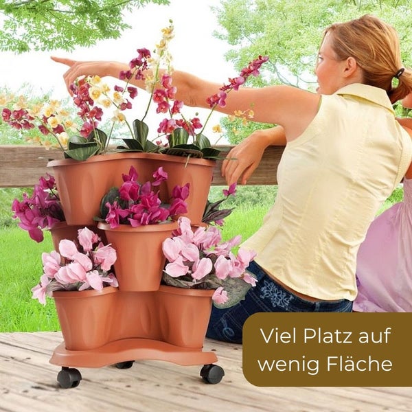 Rollbarer Pflanzenturm mit mehreren Pflanzgefäßen und Blumen
