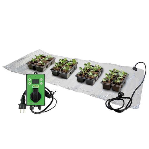 Anzuchtmatte mit Temperaturregler und Anzuchtschalen mit Pflanzen