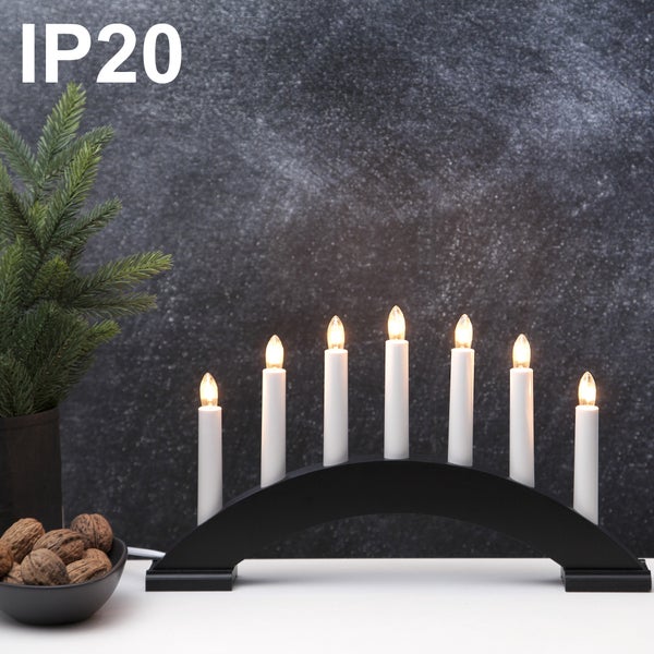 LED-Dekoleuchte in Kaktusform neben einer Kaktuspflanze