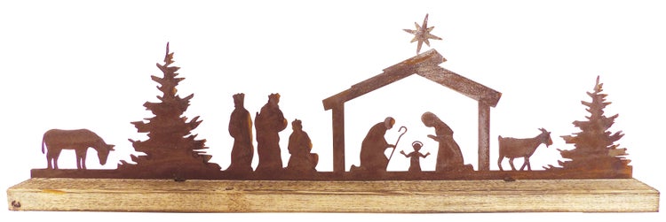 Weihnachtsdekoration Krippe aus Metall in Edelrost-Optik auf Holzsockel.