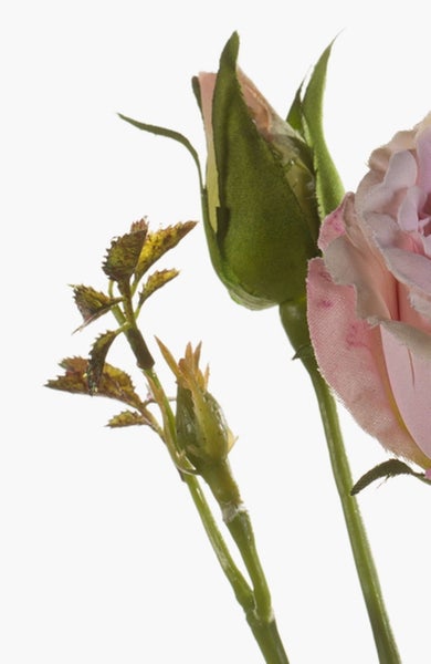 Künstliche Rose mit Blütenknospen und Blättern in Rosa und Grün.