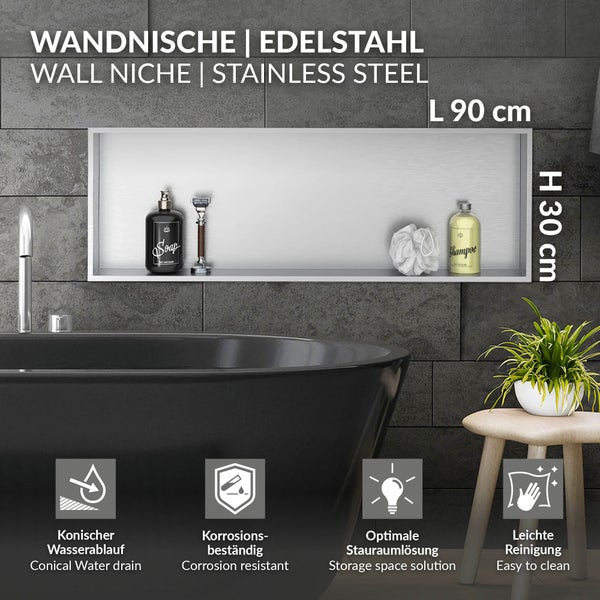 Edelstahl Wandnische im Bad über schwarzer Wanne, Maße 90 mal 30 Zentimeter, korrosionsbeständig mit konischem Wasserablauf.