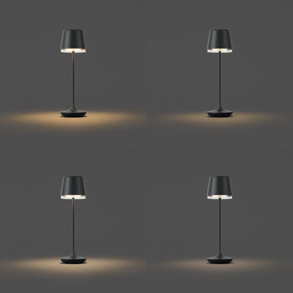 Vier schlanke, schwarze Tischlampen mit konischem Schirm, die warmes Licht nach unten abgeben.