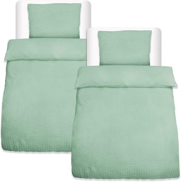 Seersucker-Bettwäsche-Set bestehend aus zwei Bettbezügen und zwei Kissenbezügen.