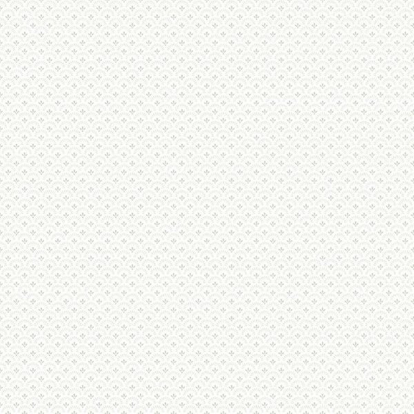 Ein Zimmer mit einer grauen Tür, einem Schreibtisch und einer Tapete mit Punktmuster