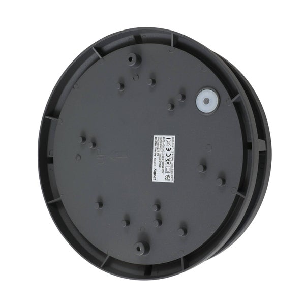 Detailansicht der Verbindung zwischen Lampenkopf und Stativ einer modernen LED Bürostehleuchte in Silber und Schwarz.