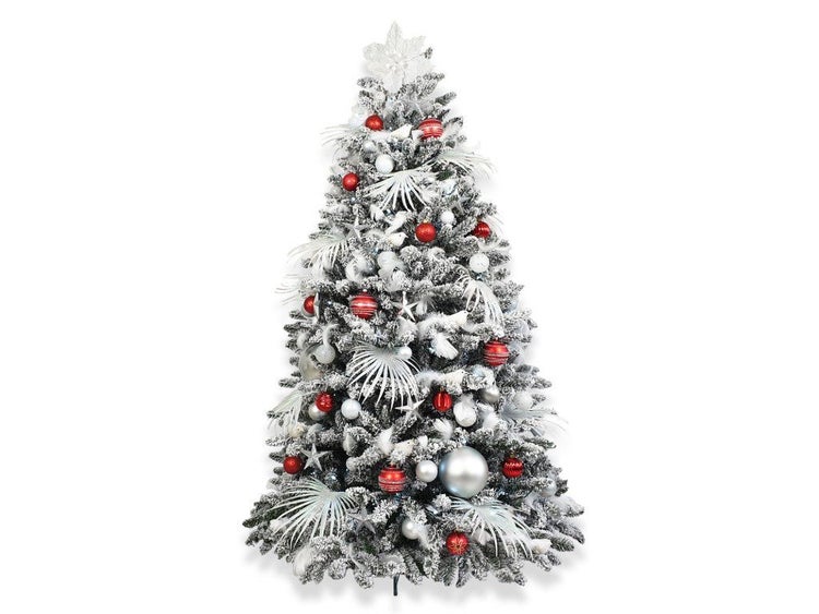 Künstlicher Weihnachtsbaum, verschneit, geschmückt mit Kugeln und Sternen.