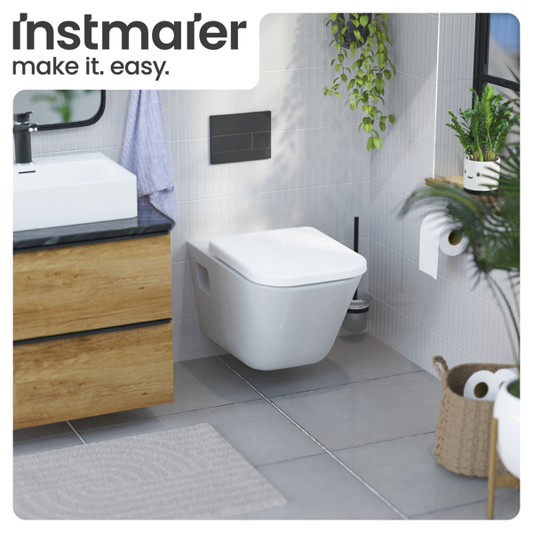 Modernes Badezimmer mit wandhängendem WC, Waschbecken mit Unterschrank und Pflanzen