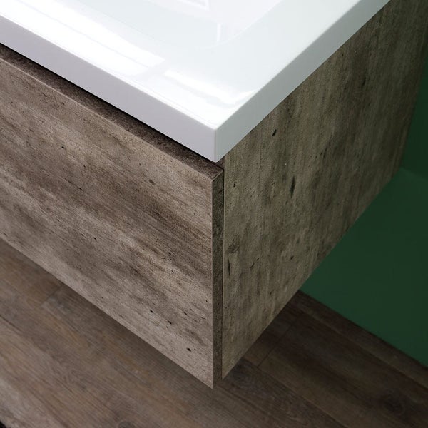 Detailansicht eines Waschtischunterschranks mit Holzstruktur und weißem Aufsatzwaschbecken