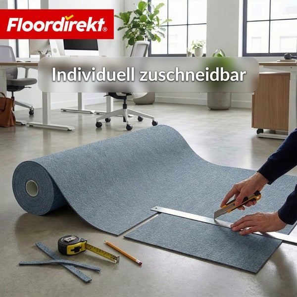 Zuschneidbarer Teppichläufer auf einer Rolle im Raum mit Werkzeugen und Lineal. Floor direkt Logo.