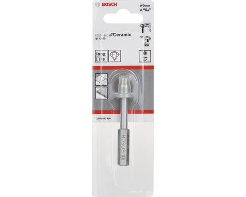 Kinderzimmer mit weißem Schreibtisch, Stuhl, Zelt und gemusterter Tapete