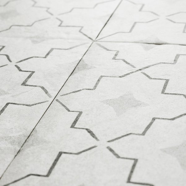 Wandfliese oder Bodenfliese mit geometrischem Sternmuster und matter Oberfläche im 4er Set.
