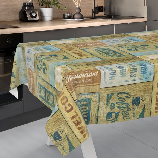 Rechteckige Wachstuch-Tischdecke mit Vintage-Schriftzügen wie Restaurant und Coffee in Holzoptik in einer modernen Küche.