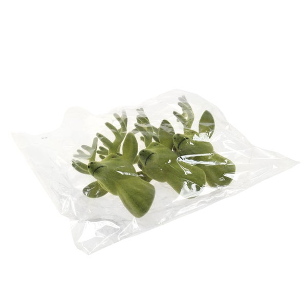 Verpackung mit mehreren grünen Hirschköpfen aus Kunststoff